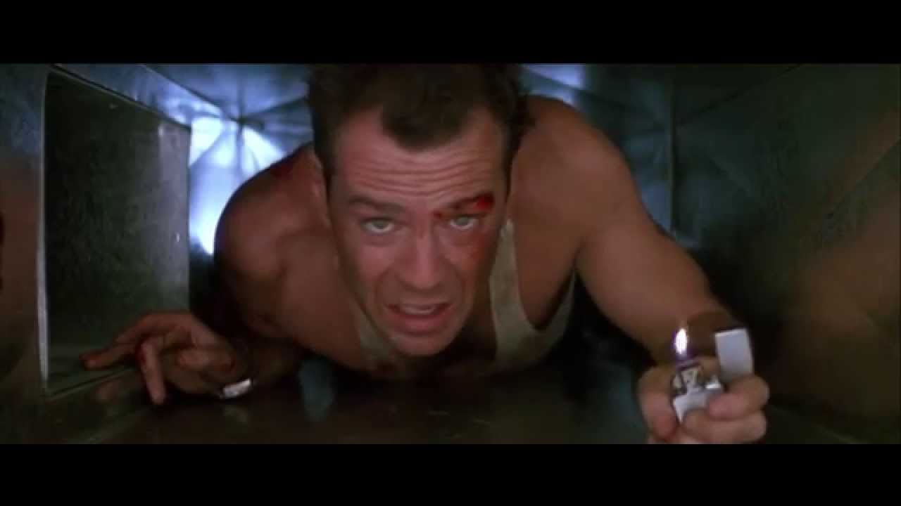 John McClane crawling through a vent in Die Hard